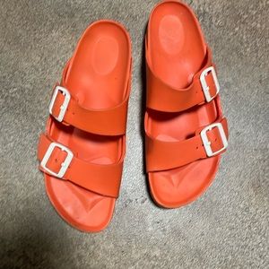 Orange Birkenstock slip on woman sandals